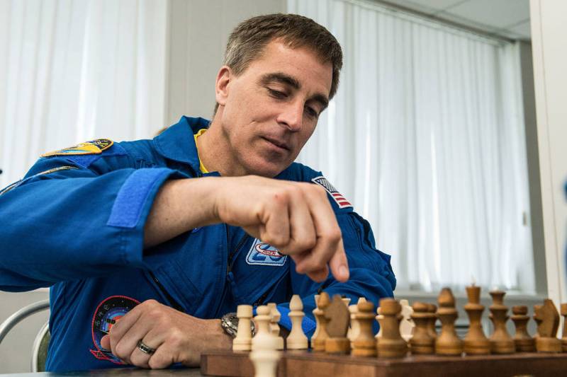 Captain Chris Cassidy Navy SEAL NASA astronaut plays chess